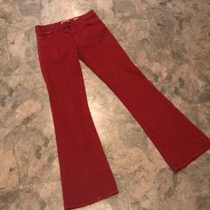 Rust colored low rise flare jeans